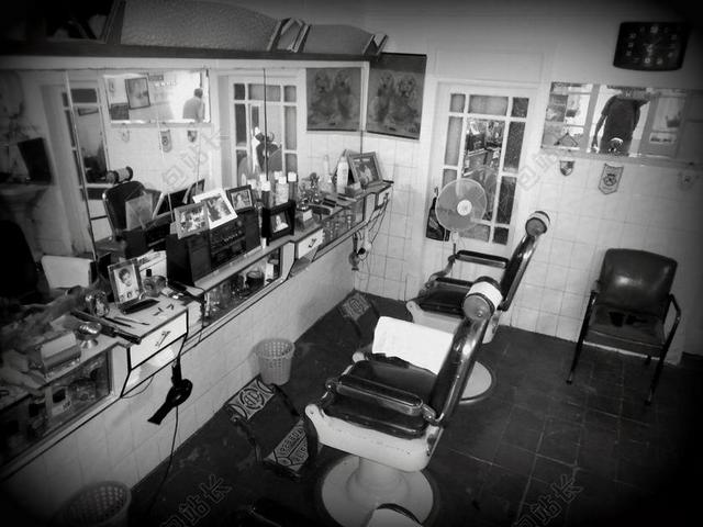 灰色理发整洁室内的理发店室内设计展示理发背景图片