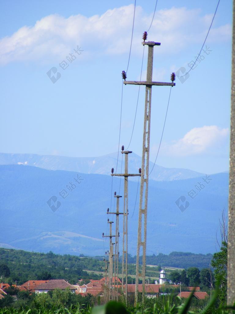 建筑高的输电电杆背景图片