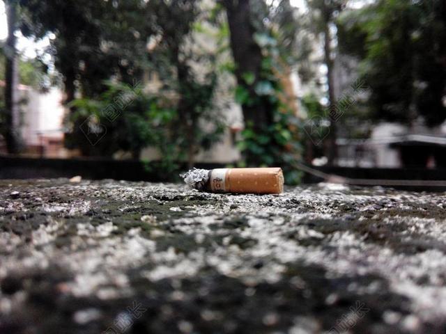 黄色娱乐健康生活抽烟地面背景图片