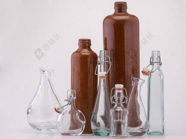 棕色艺术浪漫玻璃瓶包装酒瓶背景图片