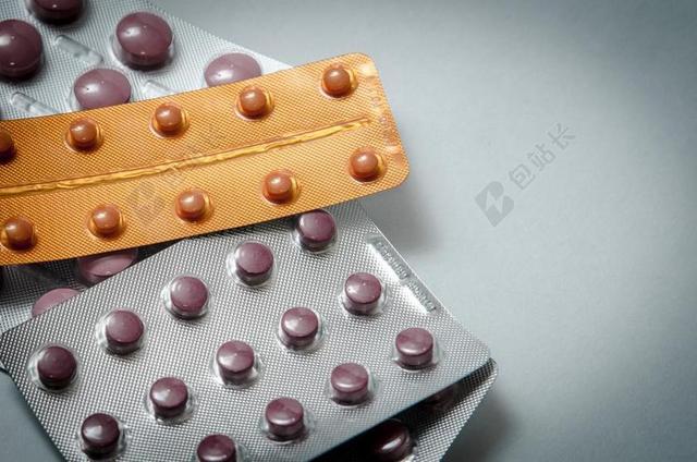 棕色医疗展示棕色的药丸背景图片