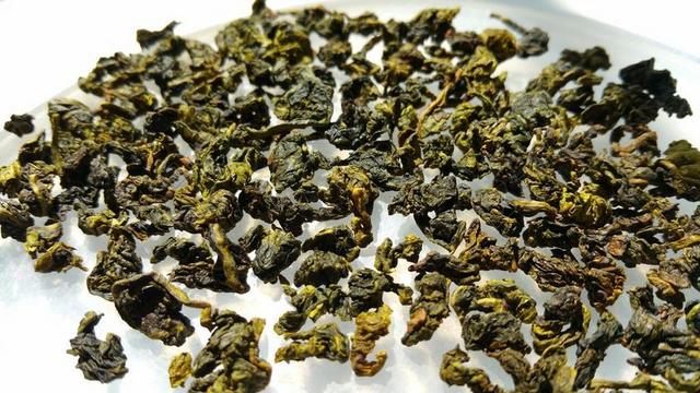 白色乌龙茶叶背景图片