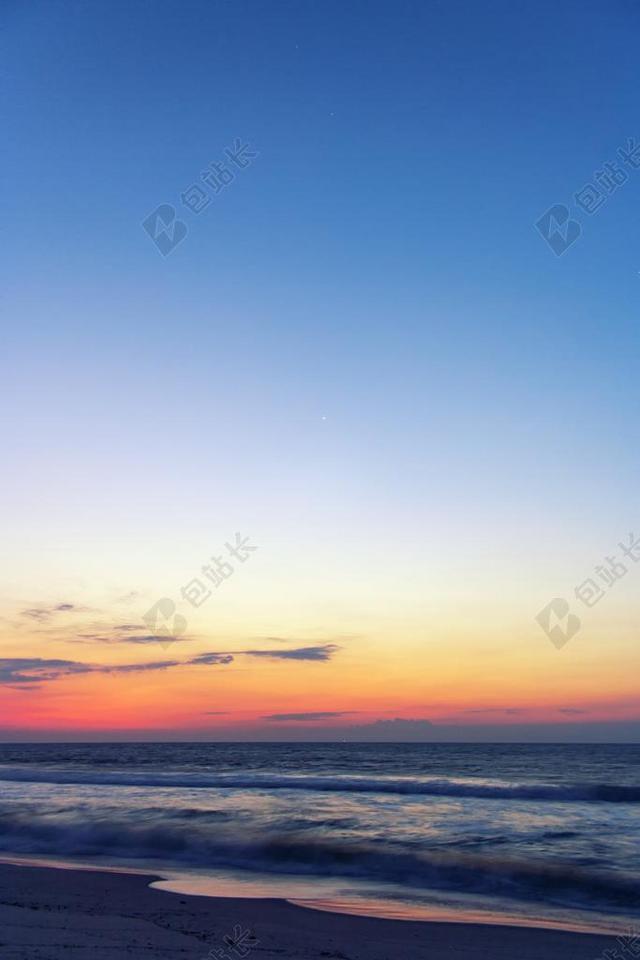 蓝色海天一线夕阳背景图片