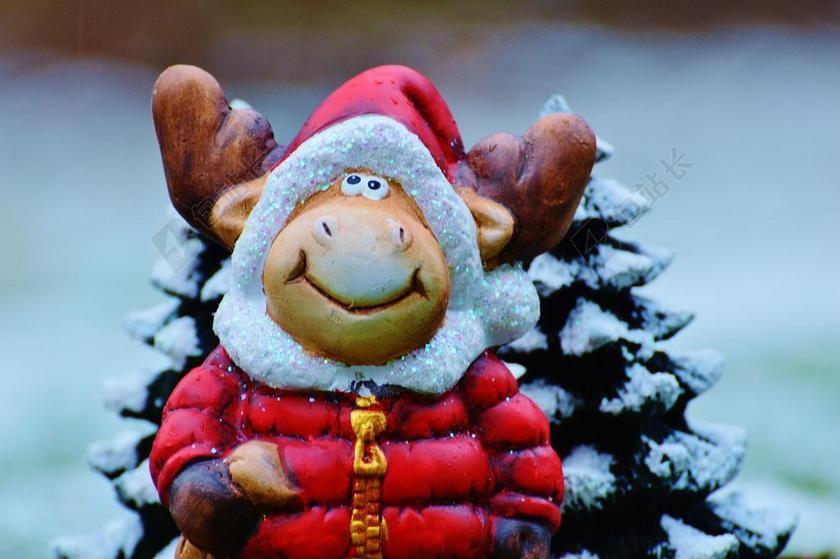 玩具快乐雪地上的圣诞麋鹿玩偶背景图片