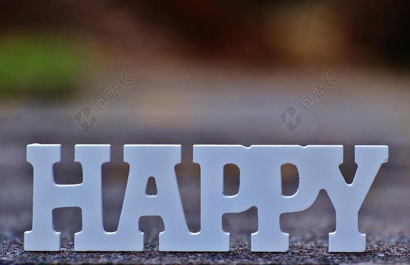 物品特写白色的高兴标志背景图片