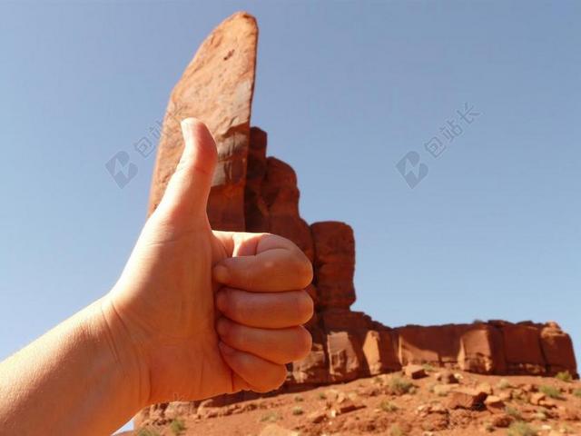 旅游自然纪念碑山谷竖起大拇指背景图片
