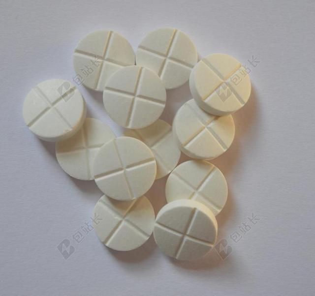 医疗白色的药片背景图片