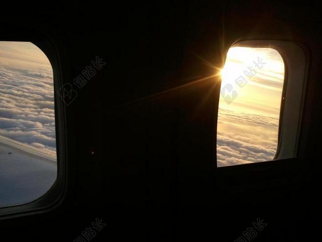 摄影简约飞机窗外夕阳景色背景图片
