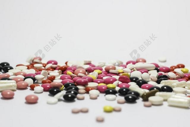 彩色医疗特写彩色药丸背景图片