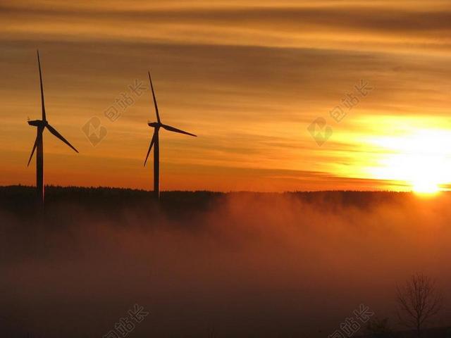 摄影唯美夕阳下的风力发电厂背景图片