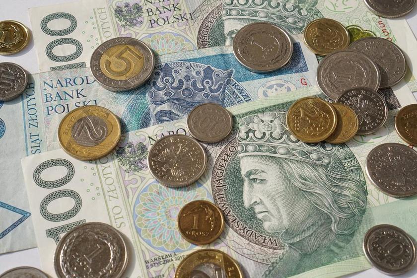 金融金属硬币和纸币背景图片