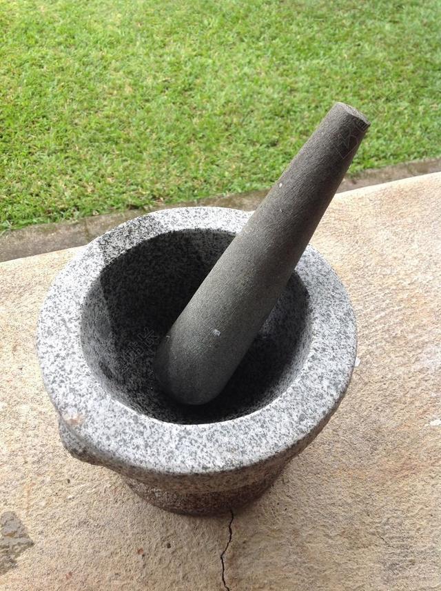 物品传统灰色的花岗岩杵背景图片