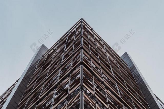 仰视现代建筑商务大厦窗口背景图片