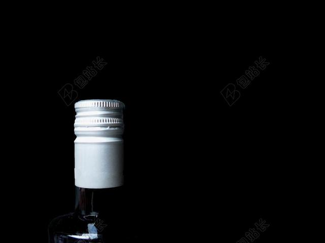 物品特写白色的酒瓶瓶盖背景图片