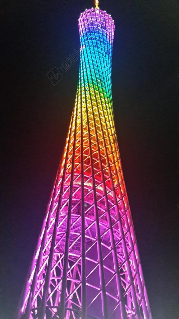 建筑夜晚彩色的高塔灯光背景图片