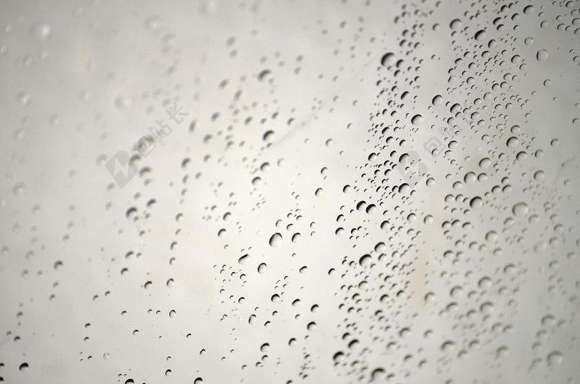 摄影清新墙壁上的雨珠背景图片