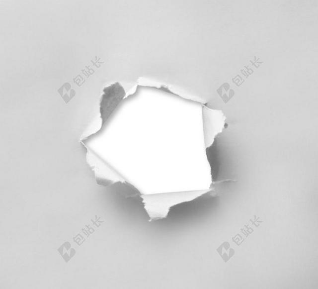 特写破损的白色纸张背景图片