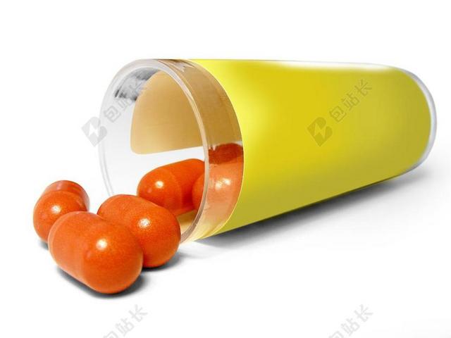 医疗橘黄色的药丸背景图片