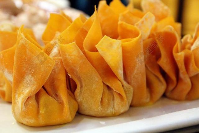 食物黄色的美味烧麦背景图片