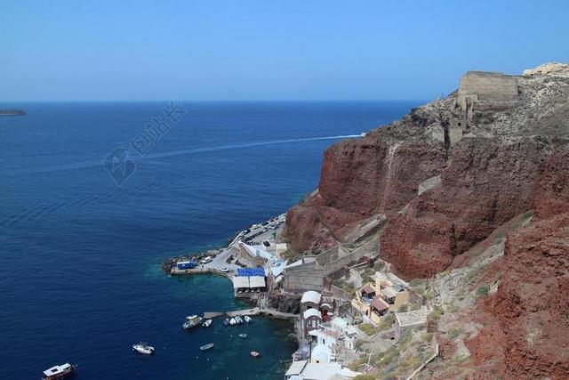 蓝色坚守住圣托里尼海边山川背景图片