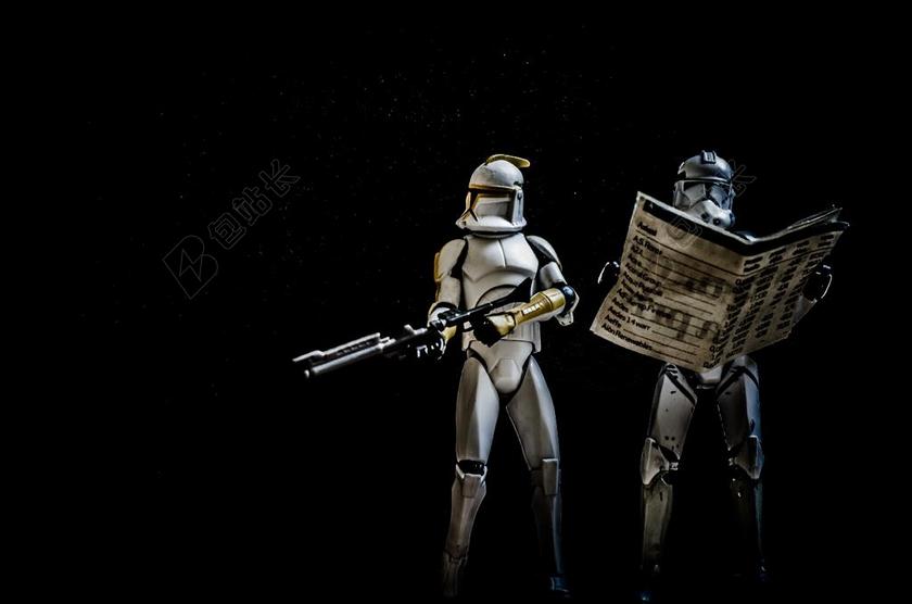 黑色星球机器人报纸背景图片