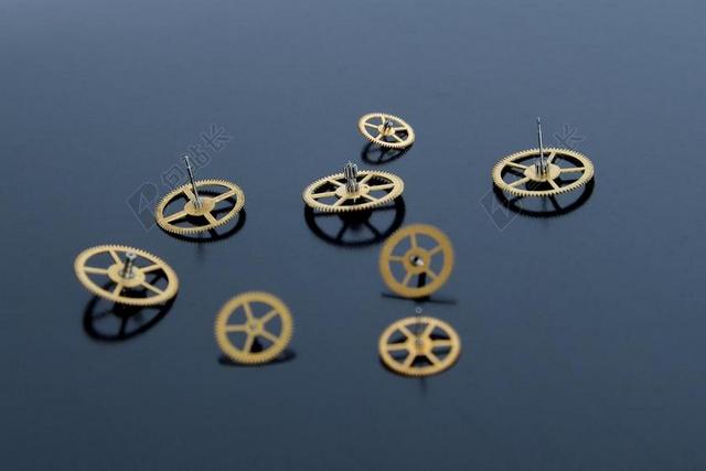 机械黄铜的金属齿轮背景图片