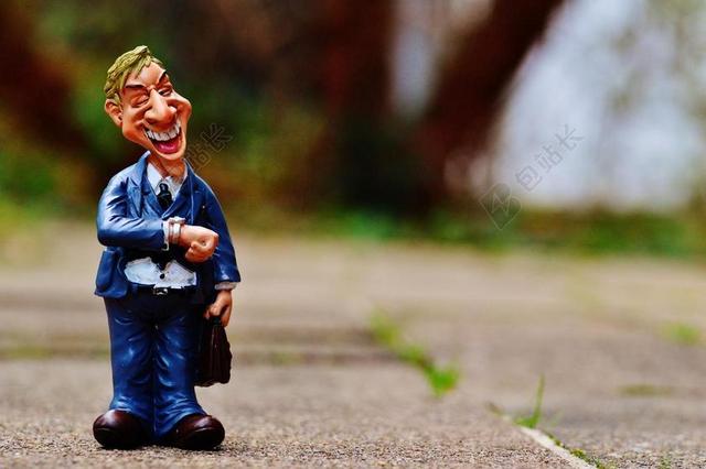 手工艺品搞笑商务男士模型背景图片