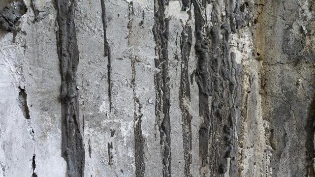 灰色建筑纹理灰色的老旧墙面背景图片