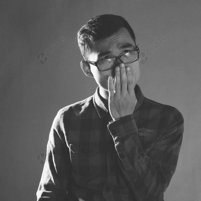 戴眼镜的男人背景图片