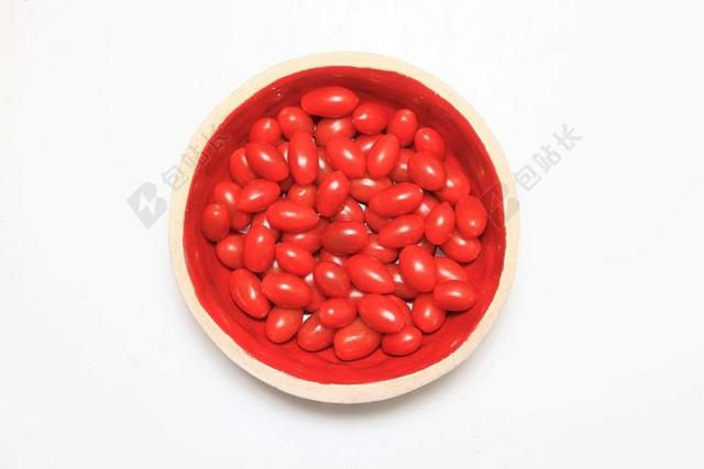 红白食物颗粒碗里面的小番茄食物美食背景图片