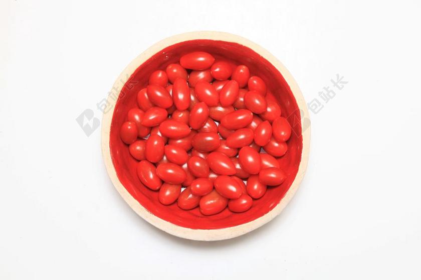 红白食物颗粒碗里面的小番茄食物美食背景图片