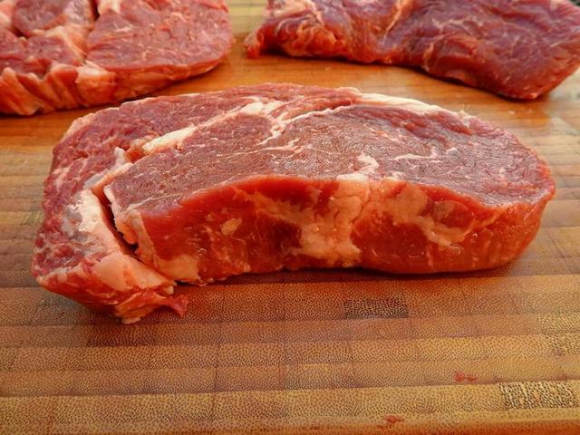 红色餐饮纹理红色的牛肉背景图片