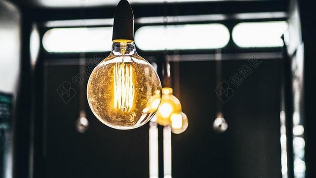 黄色广告唯美灯泡特写宣传背景图片