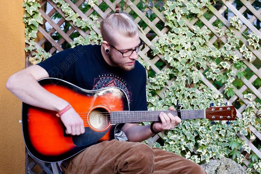 艺术音乐弹吉他外国歌手背景照片