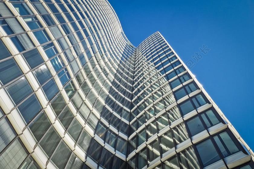 干净的弧形高楼外墙背景图片