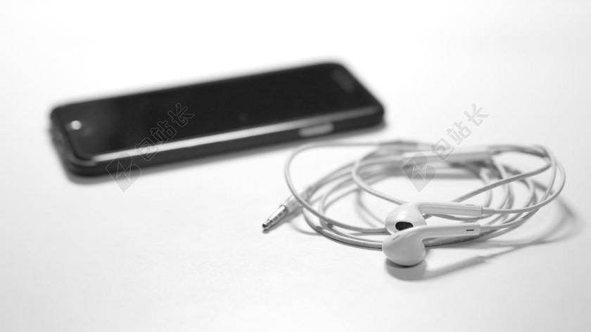 黑白电子科技黑色手机白色耳机电子产品展示宣传背景图片