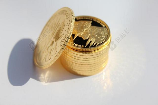 金色金融特写堆积的金币背景图片
