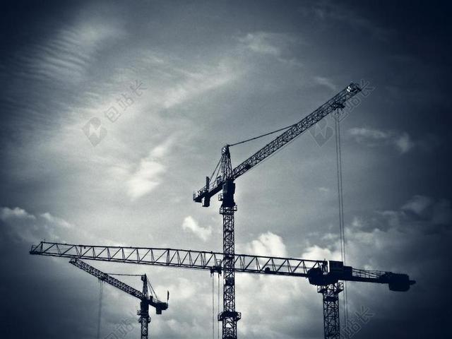 灰色建造现代工地上的起吊装置建造工具背景图片