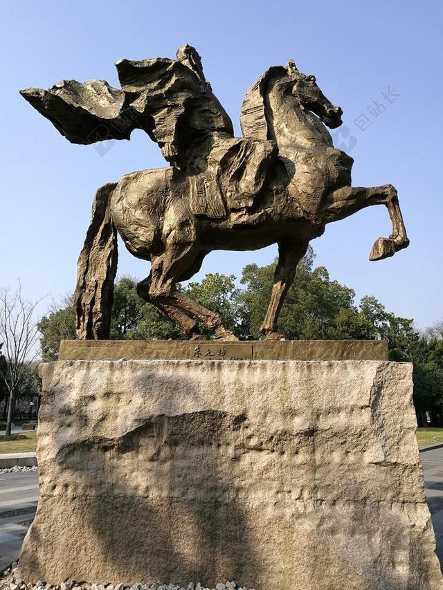 现代石雕艺术骑马英雄背景图片