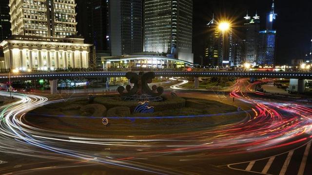 彩色建筑炫彩都市建筑交通城市夜景背景图片