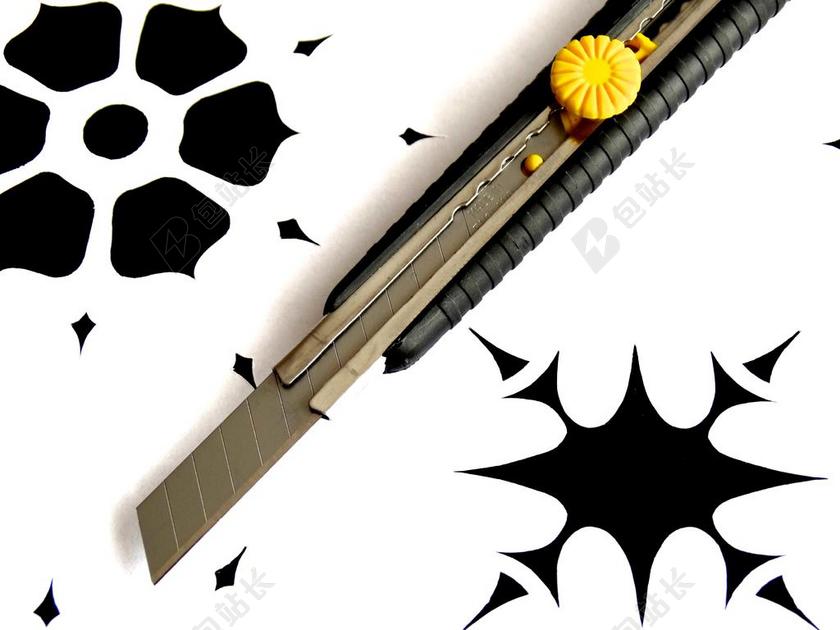 黑白美术刀设计创意花纹背景图片