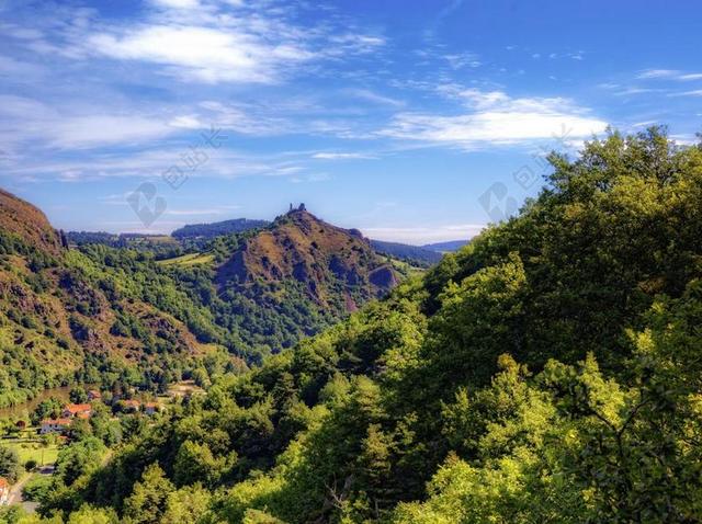 景观景色山区高山山峰峡谷森林绿地远景全景蓝天白云背景图片
