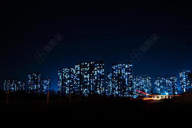 黑蓝建筑美丽黑夜中霓虹闪烁的都市城市夜景景观背景图片