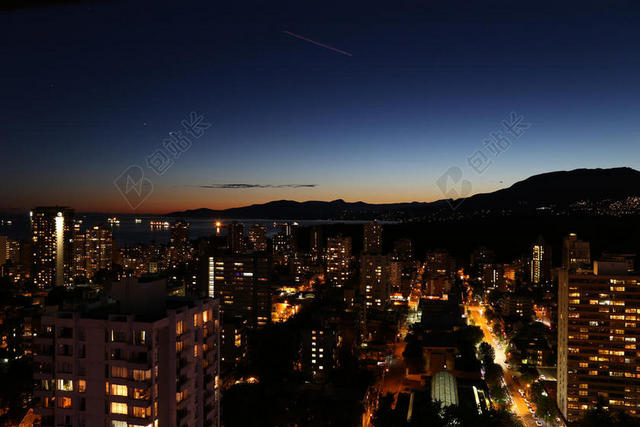 彩色建筑繁华夜幕下的霓虹都市城市景观夜景背景图片