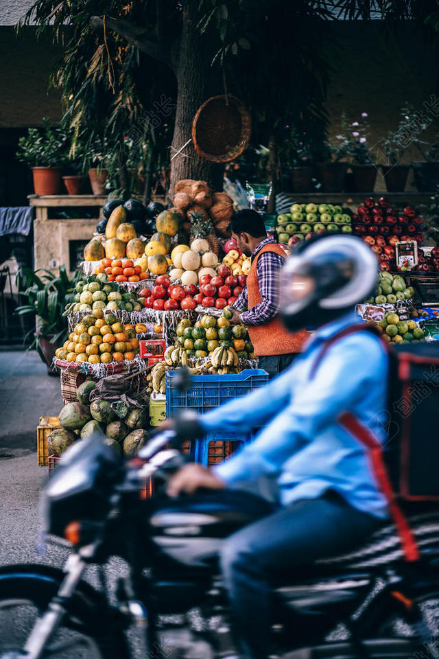 商场泰国街头的水果商店背景图片