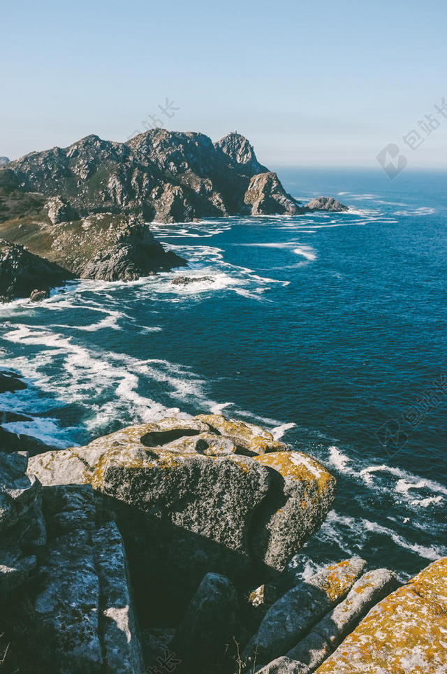 海滩 悬崖 海岸 日光 岛 景观 自然 海洋 在户外 天堂 岩石 多石的 风景 海 海景 海滨 西班牙 水