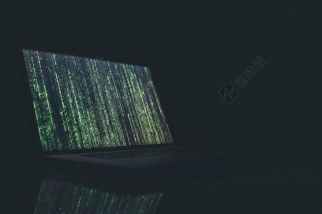 绿黑电子科技电脑上显示的页面电子产品展示背景图片