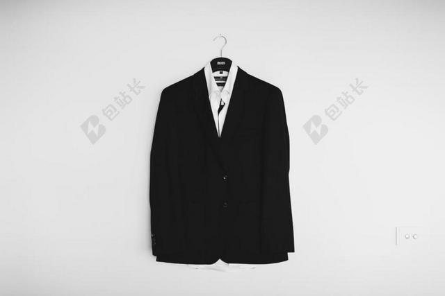 墙上的黑色西服背景图片