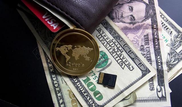 美国纸钞和金色的硬币背景图片