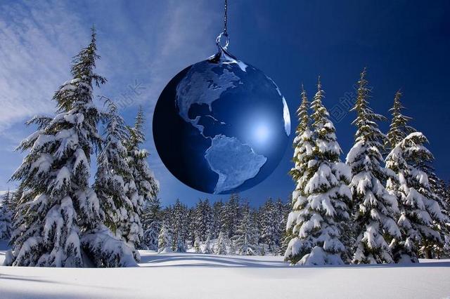 蓝色创意雪林里的地球背景图片